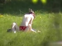 A creeper in the bushes catches a undressed pair fucking in the park with his cam. Their undressed bodies get it on and enjoy their sex without a care in the world or the slightest suspicion that someone may be lurking.