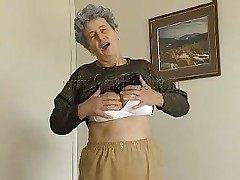 Hawt granny Rosa takes her raiment off and discloses that saggy zeppelins of hers. She squeezes them for greater amount enjoyment and lays down on the bed. The horny old lady spreads her legs and fingers her cunt a little. She has a dildo and is ready to play with it. Wanna see her sucking and sticking it in her pussy?