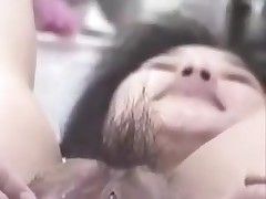 Korean wench with large snatch and pouty lips gets wicked on camera. That babe stuffs her hairy snatch with fingers, metal balls and even a bottle. This cunt can swallow a lot of semen too!